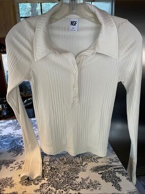 NSF soft button up pullover. Creamy white. Size small. New.